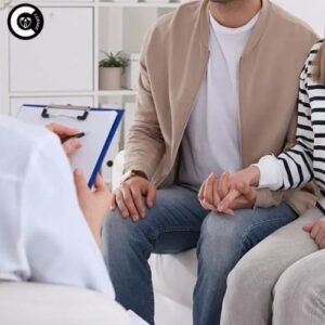 Couple holding hands and discussing STD testing with a healthcare provider